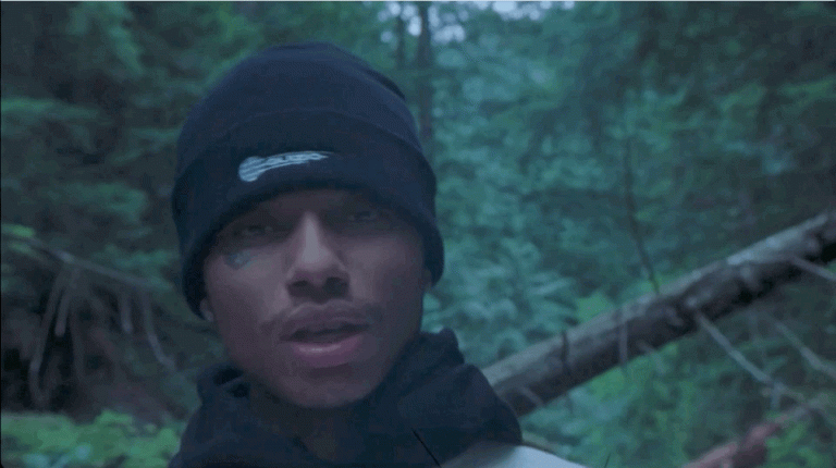 Lovell is with a Beretta in the "Alone" Video - Audible Treats